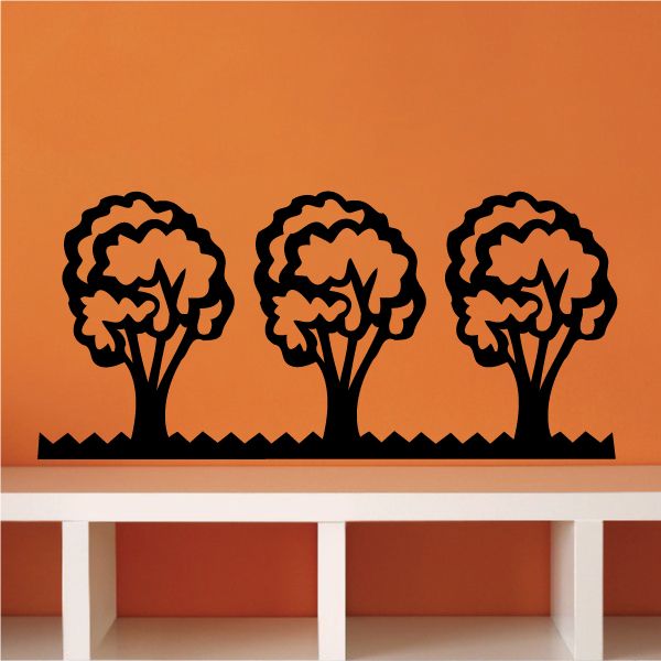 Vinyl tree wall decal with three dark brown tree silhouettes and branchy crowns