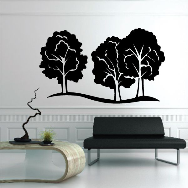 Tree wall decal with black silhouetted trees and white branch lines