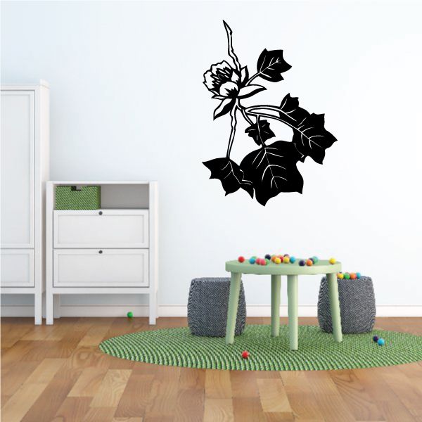 Black tree and flower vinyl wall decal with detailed leaves and blossoms