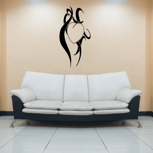 Black tribal heart decal featuring a cat-like figure and heart-shaped center