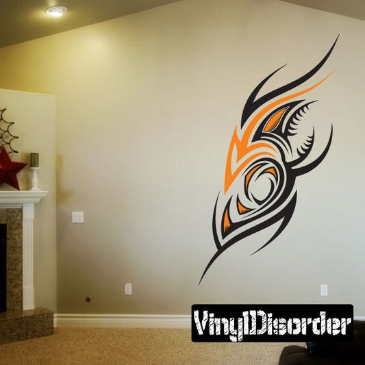 Tribal tattoo wall decal sticker with orange and black bird eye swirl design