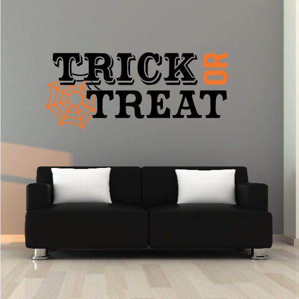 Halloween wall decal: cobweb-style “TRICK OR TREAT” lettering in black and orange