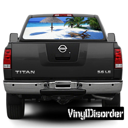 Black pickup truck tailgate with graphic rear window view and rear license plate