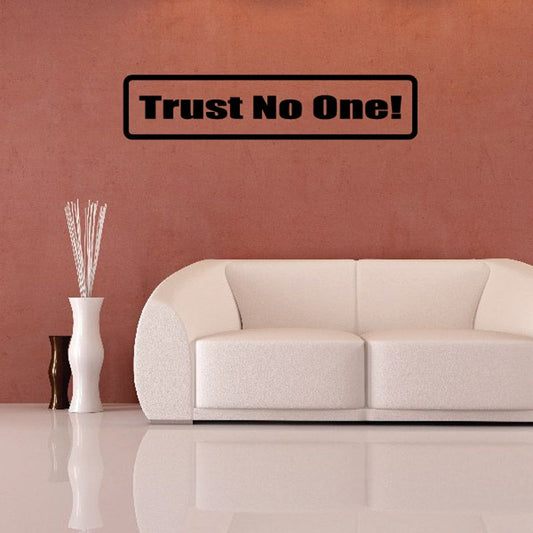 Square wall decal with black border and bold text reading “Trust No One!”