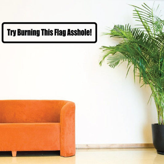 Vinyl decal sticker with black border and bold white text: "Try Burning This Flag"