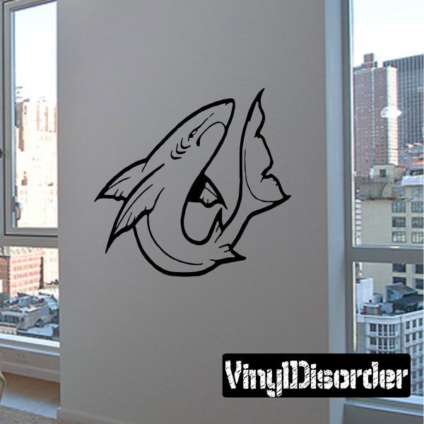 Twisting shark swimming decal in black line art on a light surface