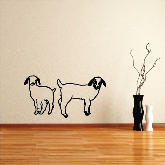 Two young Boer goat wall decals with black line-art silhouettes