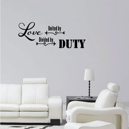 Wall decal text: “Love,” “United by,” “Divided by,” “DUTY”