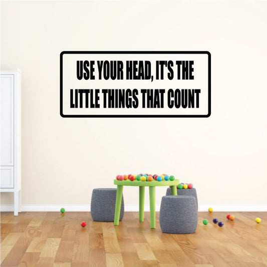 Rectangular wall decal with black border and bold quote text on white