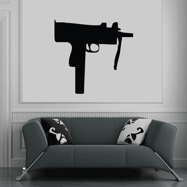 Black Uzi submachine gun aiming decal silhouette on light background