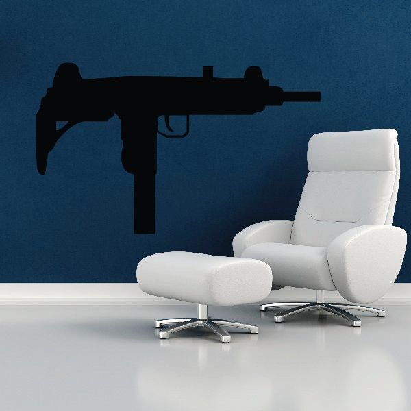 Uzi submachine gun wall decal, black silhouette of compact firearm