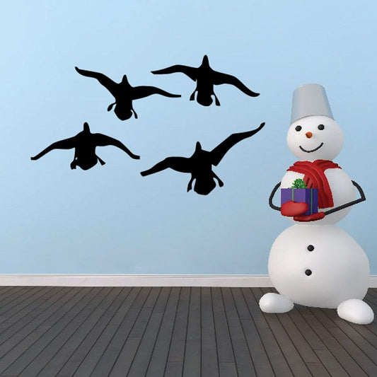Flying duck wall decal with five black duck silhouettes in flight