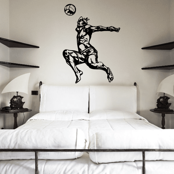 Volleyball wall decal: black player silhouette kicking a volleyball, ball above