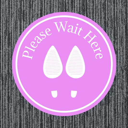 Pink round "Please Wait Here" non-slip floor sticker with feet icons