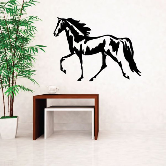 Walking mustang decal featuring a black-and-white horse silhouette