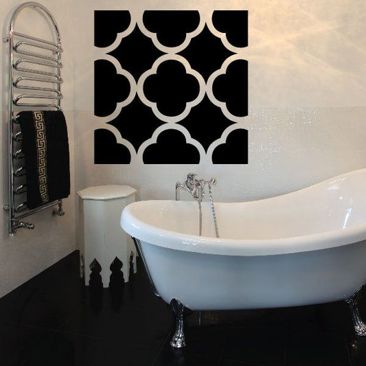 Geometric wall vinyl decal with black quatrefoil pattern