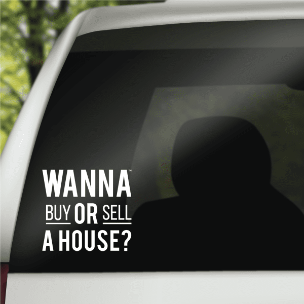 Car window decal with text "WANNA BUY OR SELL A HOUSE?"