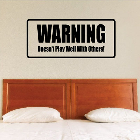 Rectangular wall warning decal reading WARNING Doesn't Play Well With Others