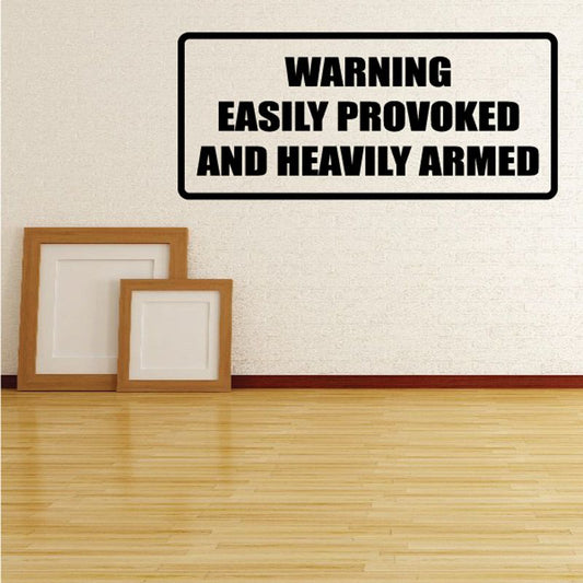 Warning decal reading "WARNING EASILY PROVOKED AND HEAVILY ARMED"