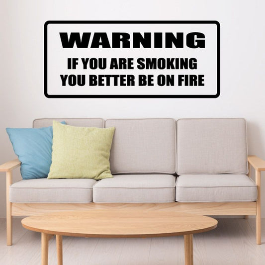 Warning decal, rectangular sign with black border and bold text: IF YOU ARE SMOKING