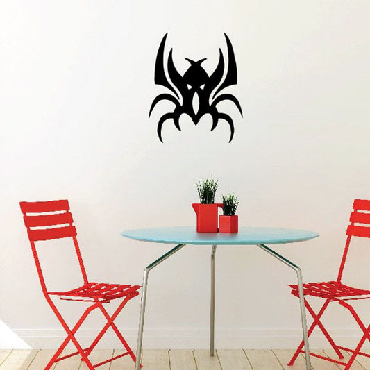 Black warrior crab decal with horned tribal head and spiked claws