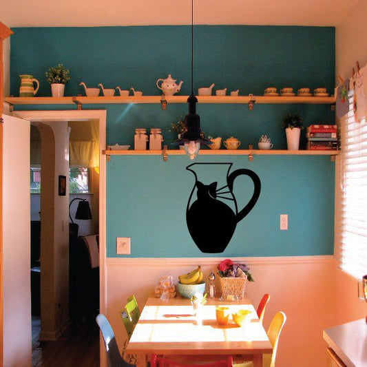 Black water jug decal with handle and spout on green wall