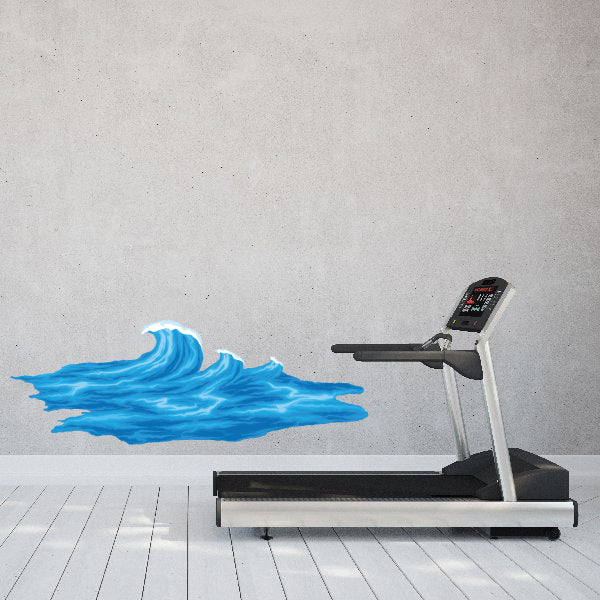 Exercise space with a wall sticker of a wave near a treadmill