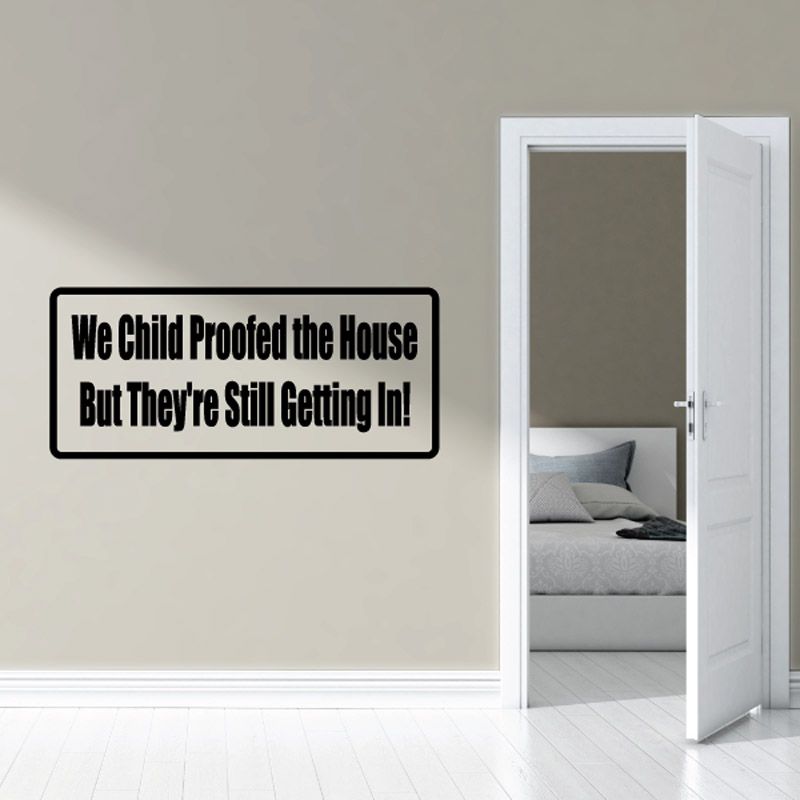 Vinyl wall decal with black border and white quote text: “We Child Proofed the House”