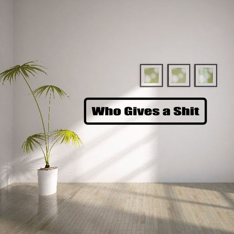 Vinyl wall decal with bold black text 'Who Gives a Shit' in white border
