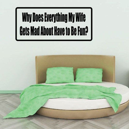 Rectangular black decal with white quote text: “Why does everything my wife…fun?”