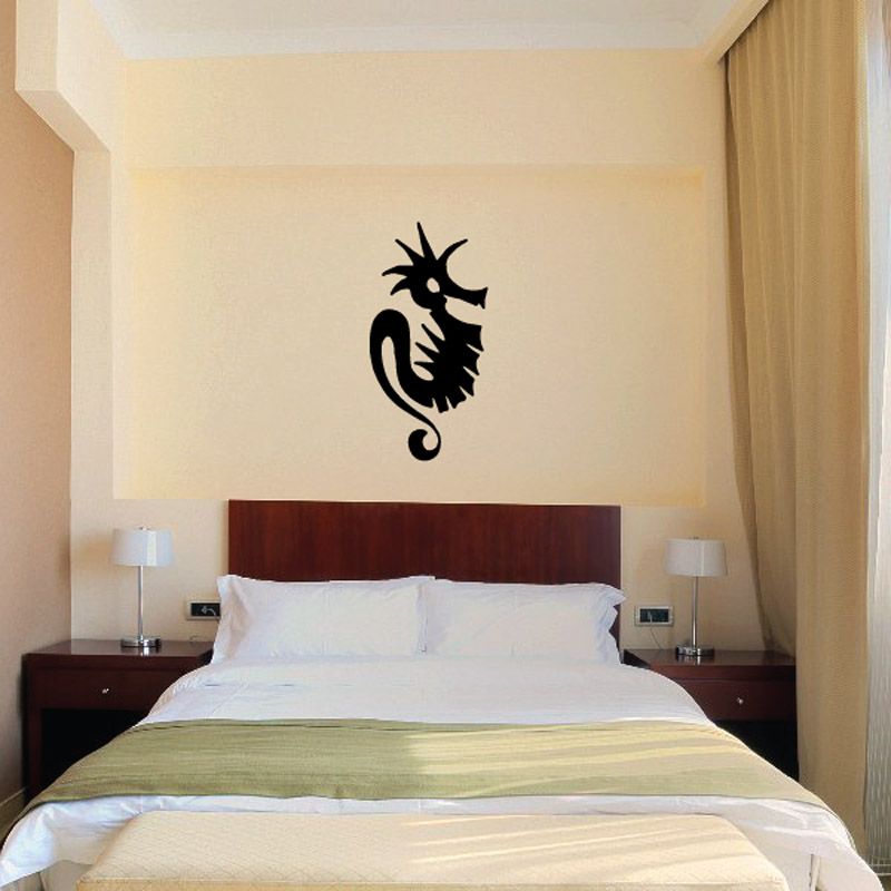 Black wicked seahorse wall decal with spiky crown and curled tail