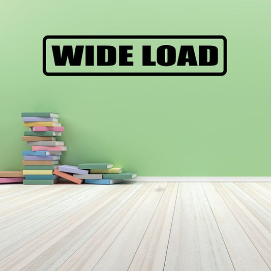 Wide load decal with bold black "WIDE LOAD" text in outlined rectangle
