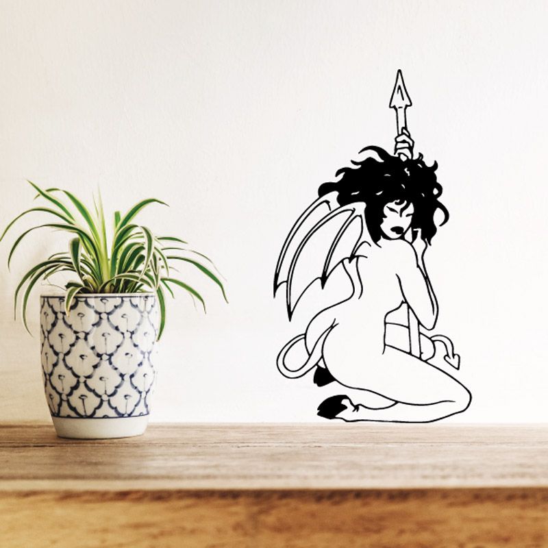 Women silhouette wall decal of seated winged woman holding spear