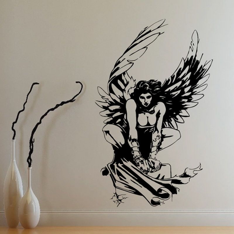 Black vinyl wall decal of a winged woman silhouette, detailed sketch style