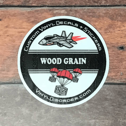 Wood-grain laminate panel with black circular label 'WOOD GRAIN'