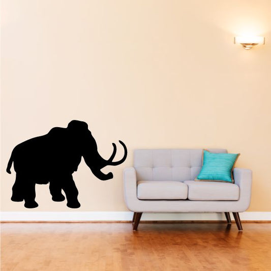 Mammoth animal wall decal, black silhouette with curled trunk and tusks.