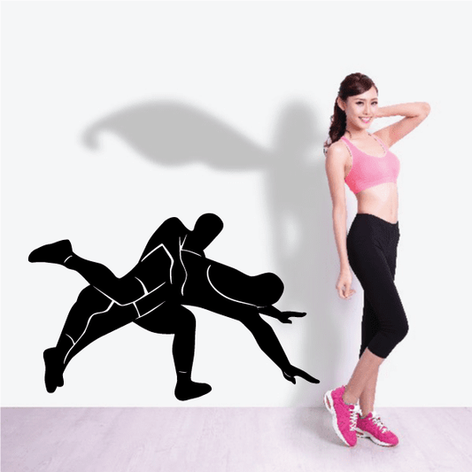 Wrestling throwing decal with bold black silhouette of grappling wrestlers