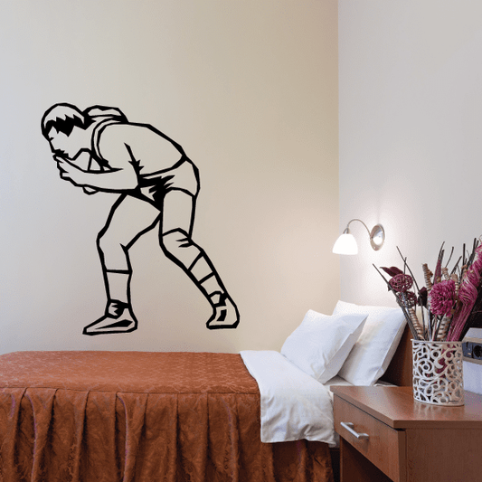 Wrestling wall decal of a black-outlined wrestler in a bent forward stance
