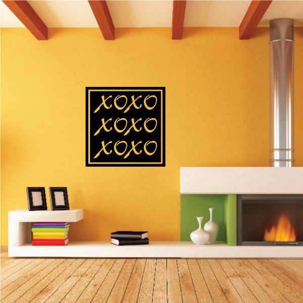 Square wall decal with black frame and stacked XOXO hearts in light script