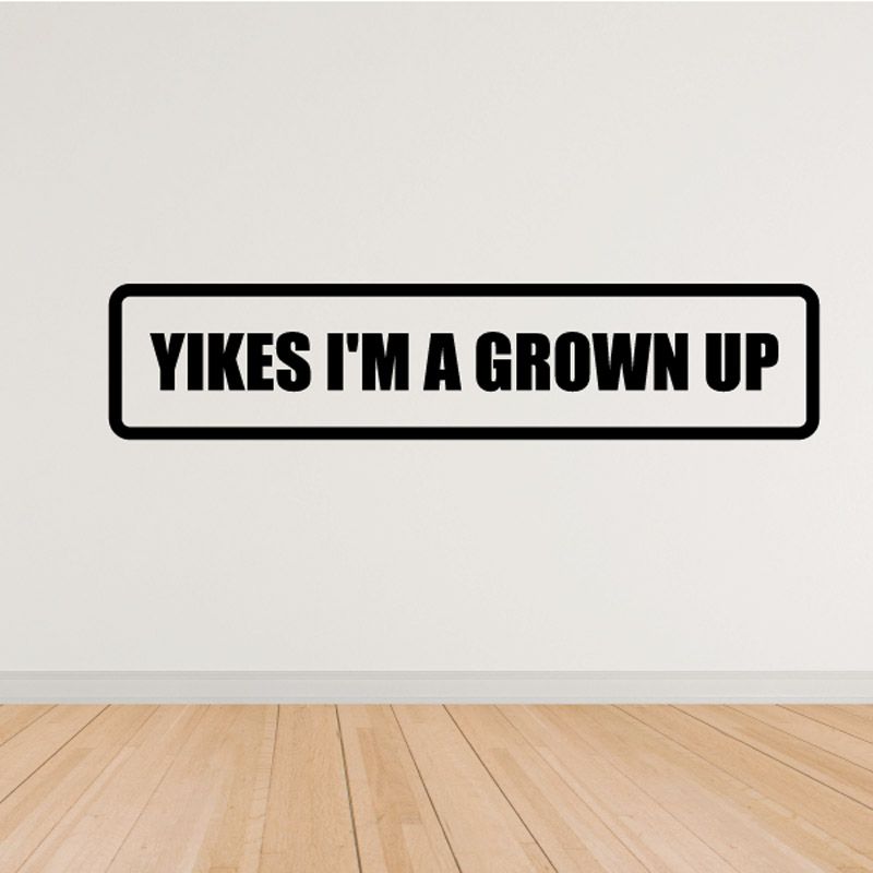 Wall decal with black border reading “Yikes I’m a grown up”