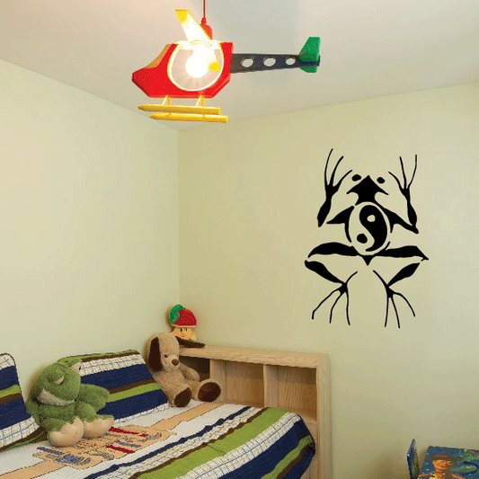 Yin-yang frog wall decal in black with yin yang eye design