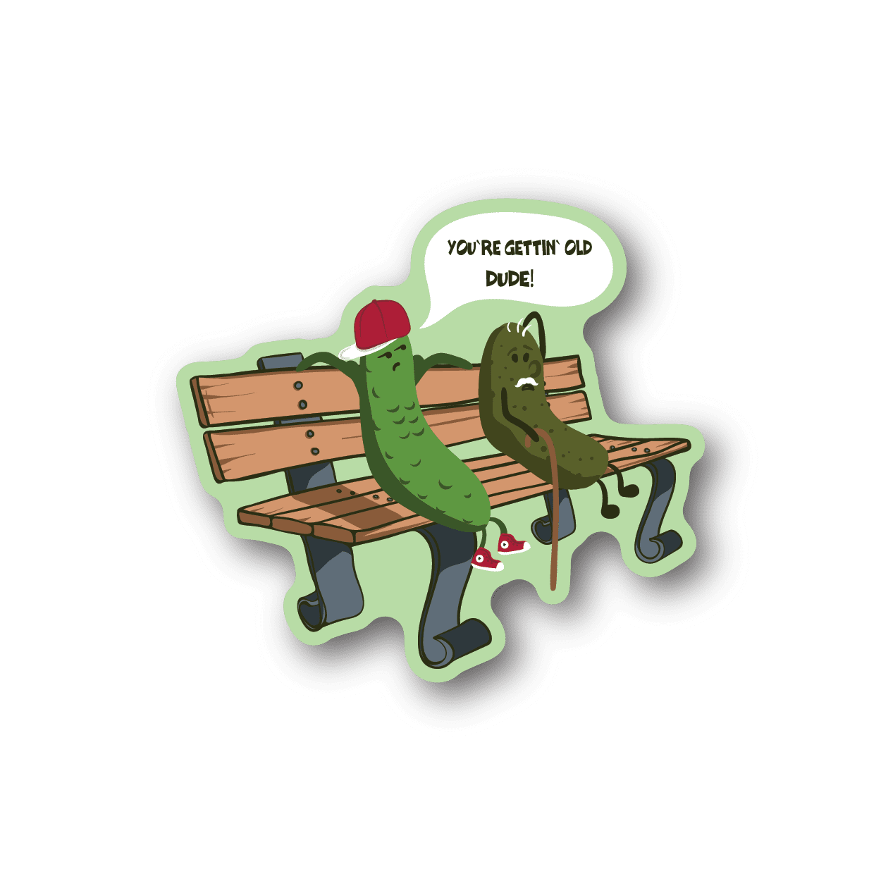 Vinyl sticker of two green pickles on a wooden bench with text in a speech bubble.