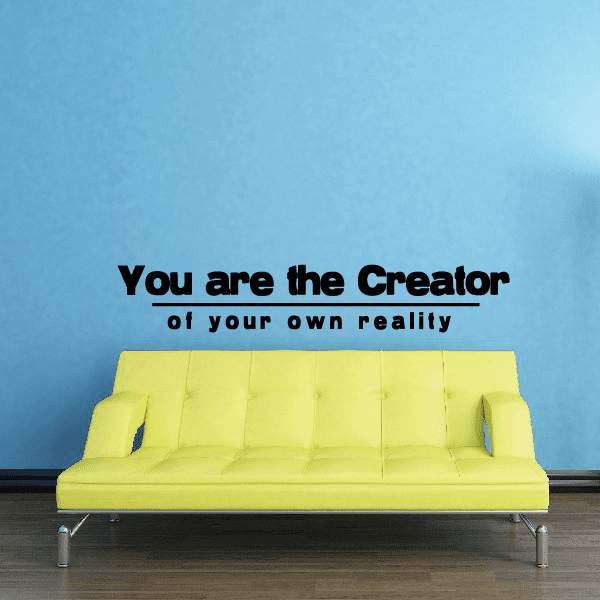 Wall decal: “You are the Creator of your own reality” text in black