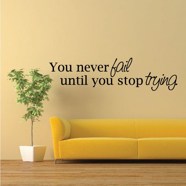 Wall decal with text “You never fail until you stop trying” in mixed cursive
