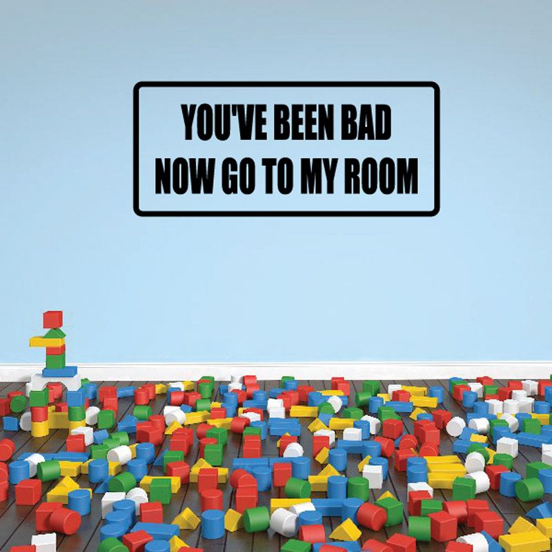 Wall decal sign with bold black border and yellow/white text: YOU'VE BEEN BAD