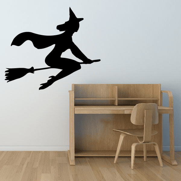 Young flying witch wall decal, black silhouette with broom in flying pose