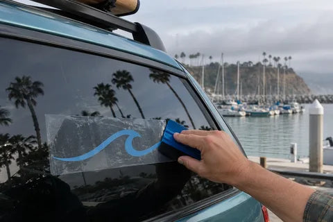 Illustrative installation using a squeegee over temporary transfer tape