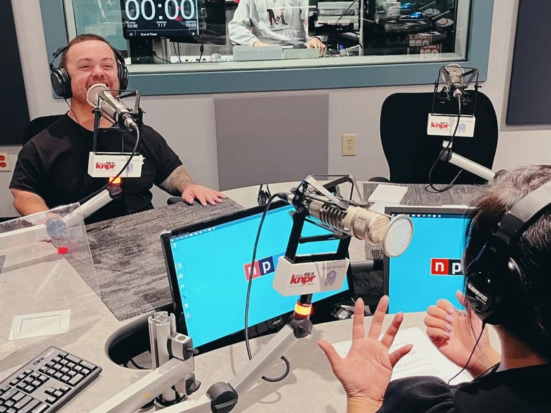 Jason Wee Man Acuña visiting KNPR for an interview