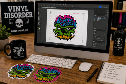 Designer preparing Vinyl Disorder sticker artwork with a clean outer cut line at a professional workstation