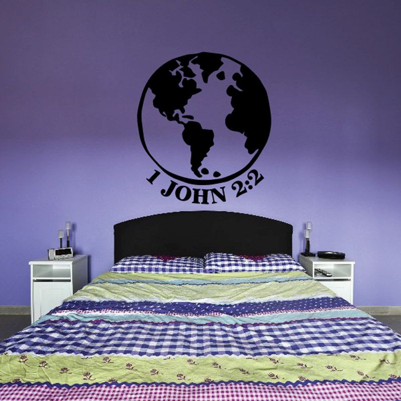 Bible verse wall decal with black globe silhouette and text “1 JOHN 2:2”